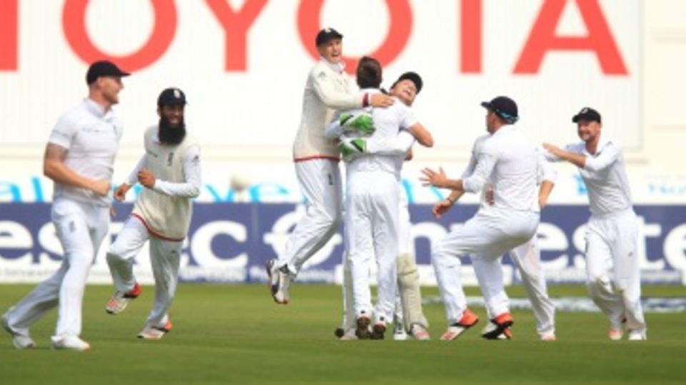 The England players get together after regaining the Ashes