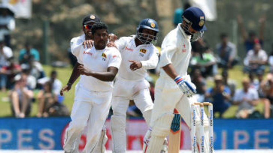 Rangana Herath is all fired up after getting the wicket of Ajinkya Rahane