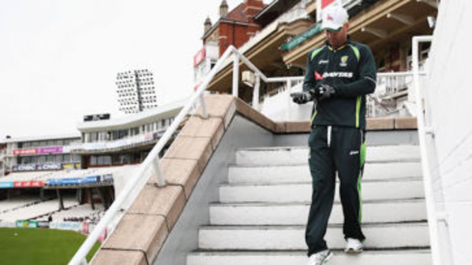 Michael Clarke walks onto The Oval outfield