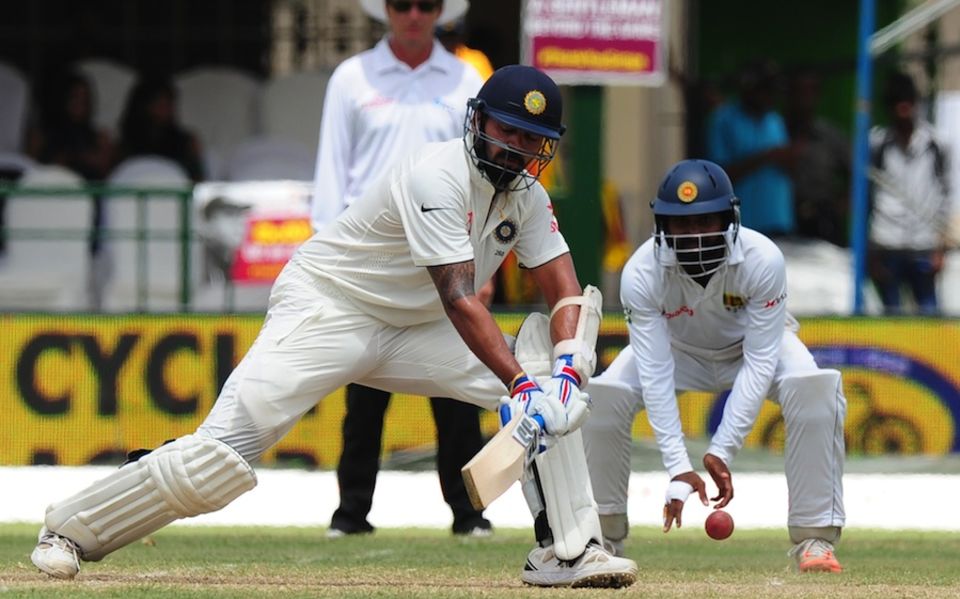 Vijay was trapped lbw by Tharindu Kaushal for 82, but Rahane's fluency did not suffer
