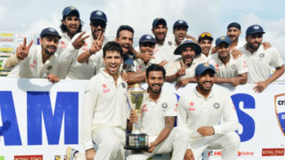 The victorious India team with the trophy
