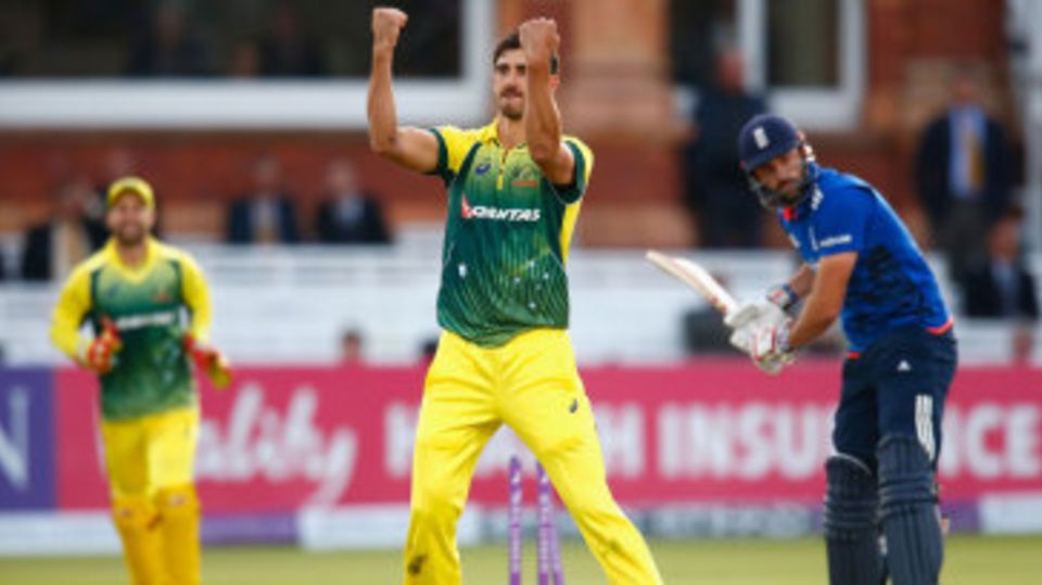 Mitchell Starc celebrates after taking the wicket of Liam Plunkett
