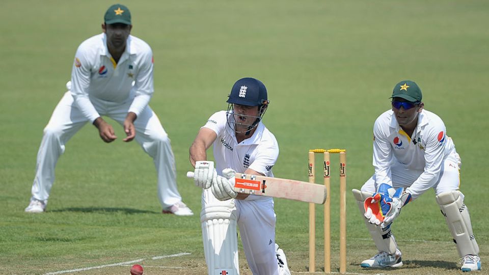 Sticking to the conventional: Alastair Cook sweeps during his half-century in the first warm-up match