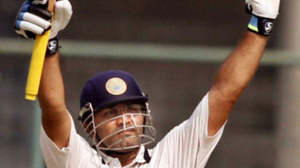 Virender Sehwag celebrates his fifty against his former team, Delhi