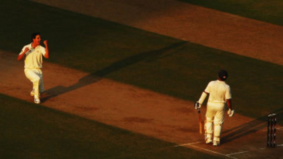 Mitchell Johnson celebrates getting Sachin Tendulkar