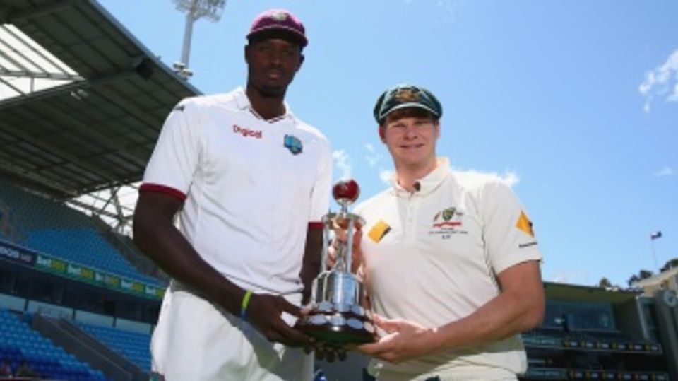 Captains Jason Holder and Steven Smith pose with the Frank Worrell Trophy