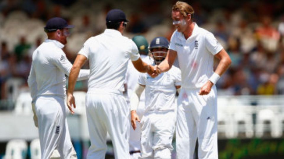 Stuart Broad gets a handshake for England's first wicket in 70 overs