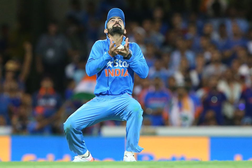 India fought back with the wickets of both batsmen in quick succession, with Kohli holding on to a high catch to dismiss Marsh