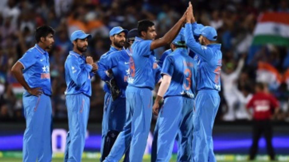 R Ashwin is mobbed by his team-mates