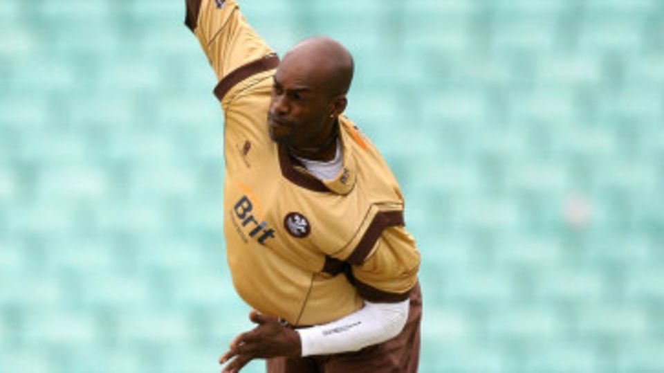 Chris Lewis in action on his Surrey comeback