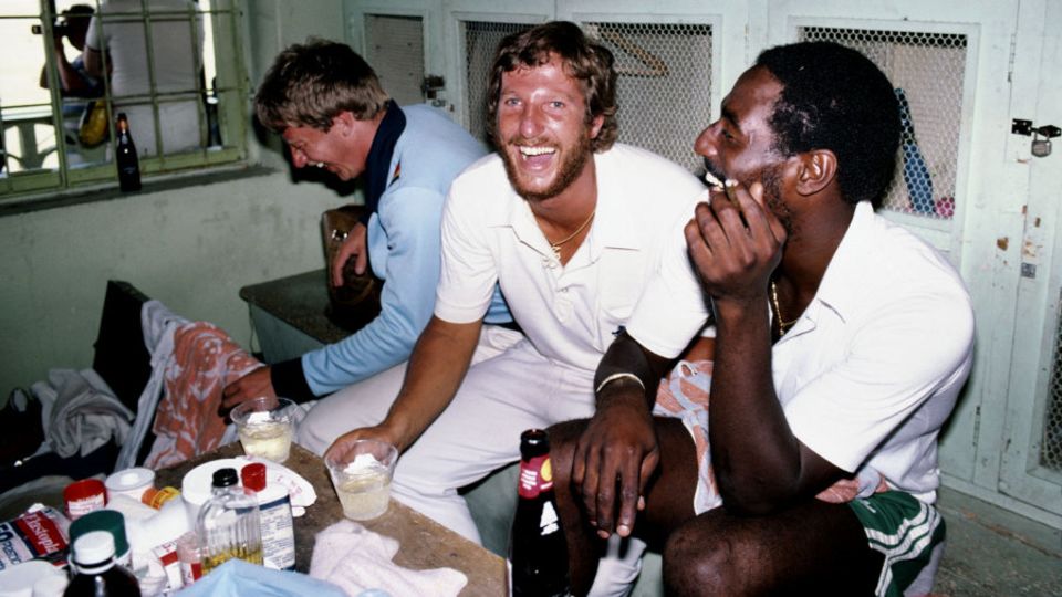 Ian Botham and Viv Richards enjoy a drink or two in the dressing room during the 1981 series