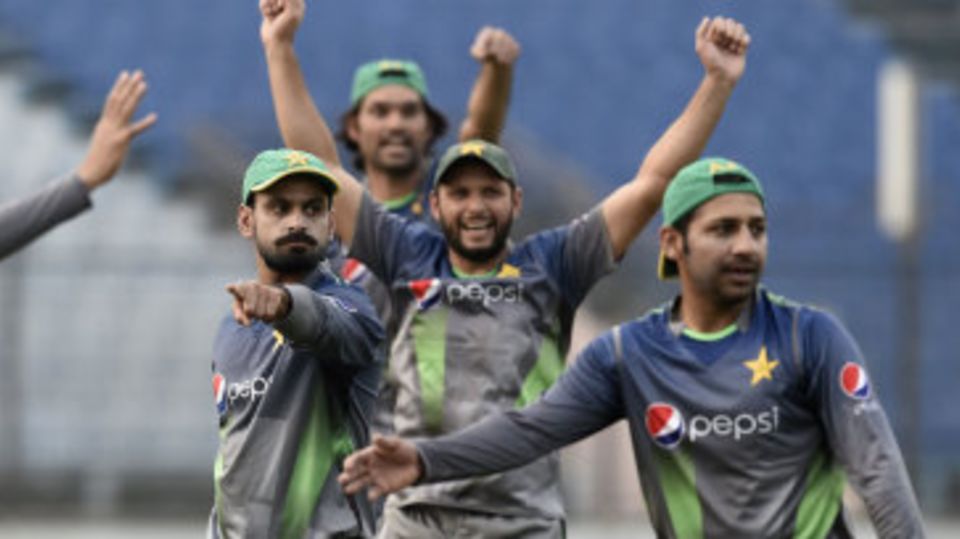 Members of the Pakistan team gesticulate during a game of soccer