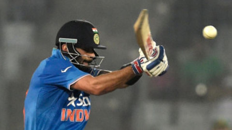 Virat Kohli pulls during his 51-ball 49
