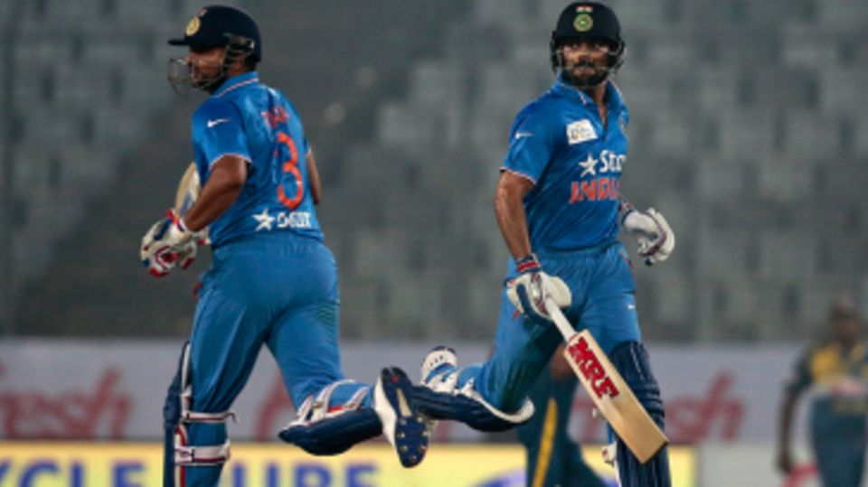 Suresh Raina and Virat Kohli steered India's chase with a 54-run, third-wicket partnership