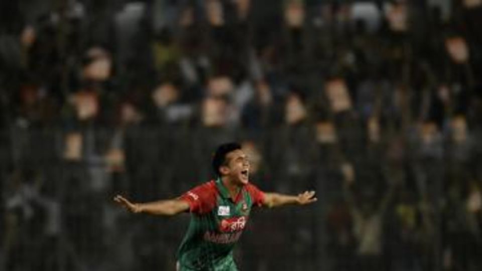 Taskin Ahmed shows his delight after taking a wicket