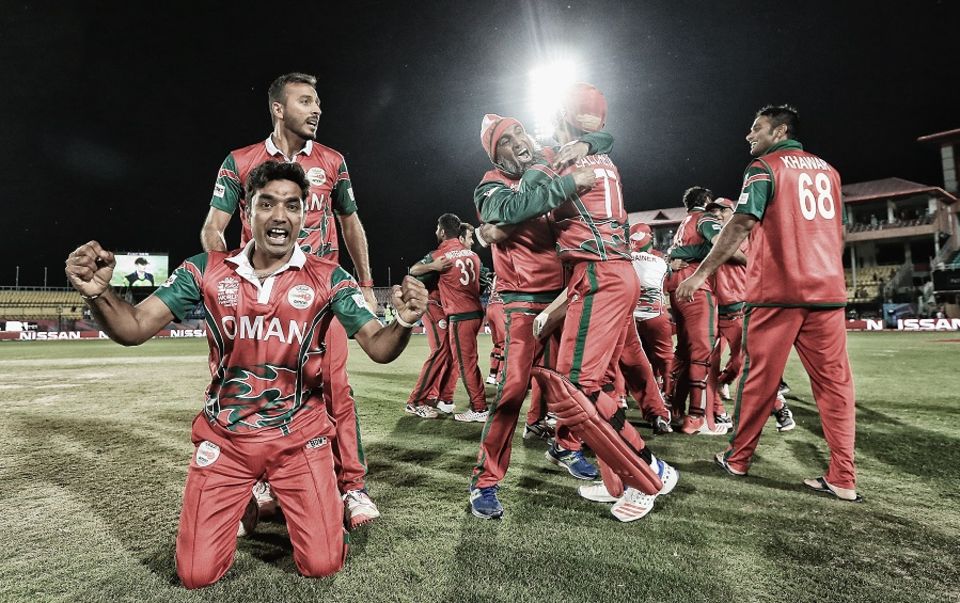 Oman celebrate their dramatic victory over Ireland in Dharamsala