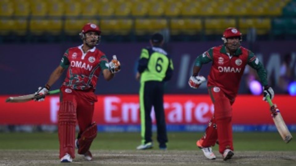 Ajay Lalcheta and Munis Ansari celebrate Oman's two-wicket win over Ireland