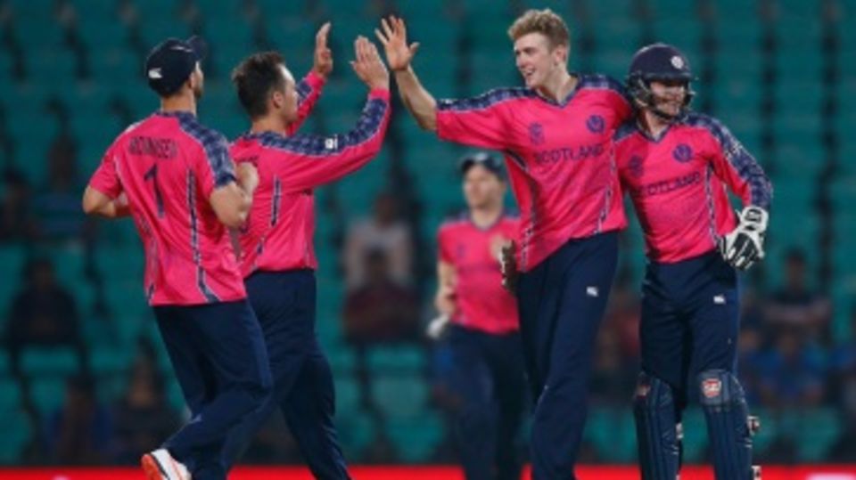 Gavin Main celebrates a wicket with his team-mates
