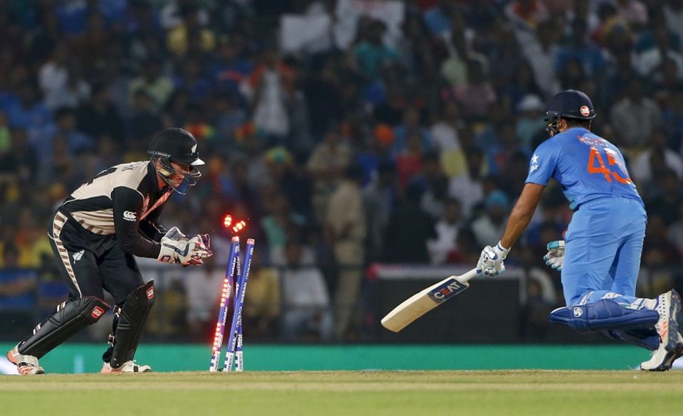 Rohit Sharma was stumped for 5 in the third over as New Zealand's spinners began to choke the home side