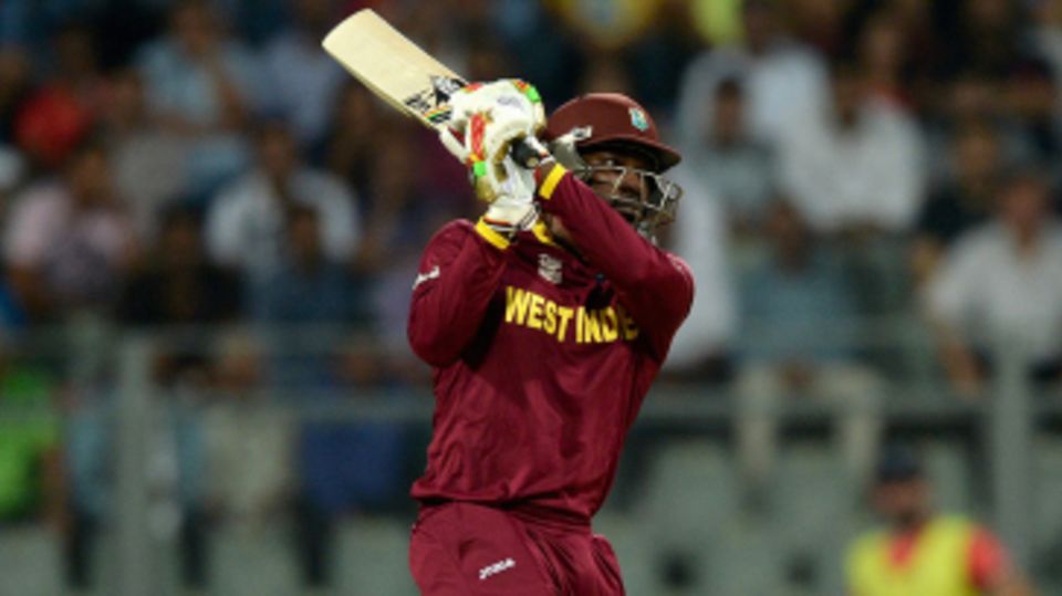 Chris Gayle smacks a six down the ground