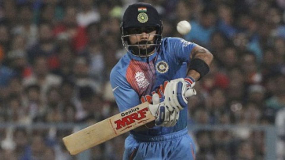 Virat Kohli defends off the back foot