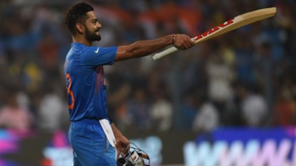 Virat Kohli celebrates after taking India home