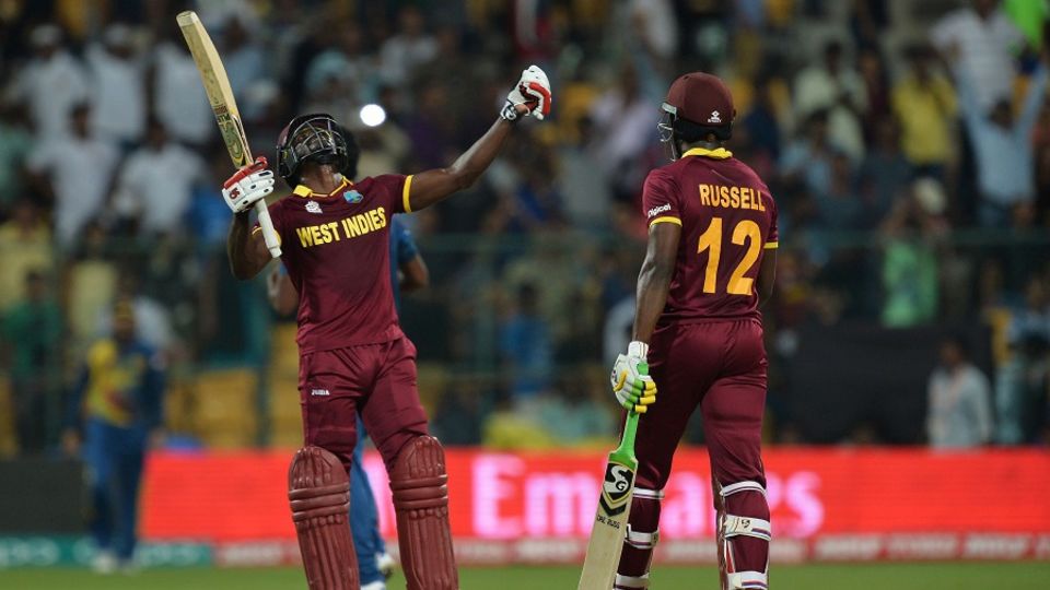 Andre Fletcher and Andre Russell celebrate West Indies' win