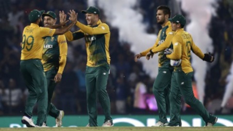 South Africa celebrate the fall of a wicket