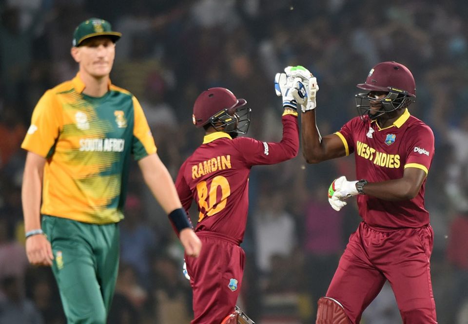 Carlos Brathwaite heaved Rabada over midwicket for a six off the second ball to help West Indies to a tight win and a spot in the semi-finals