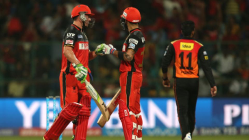 Virat Kohli and AB de Villiers punch gloves during their blistering partnership