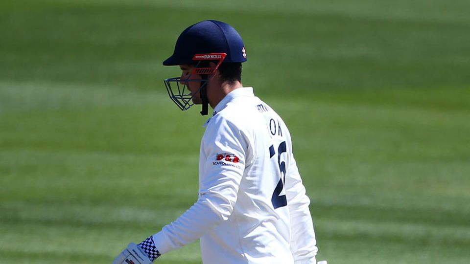 Alastair Cook trudges off after making 1 from five balls in his first innings with his ECB-approved new helmet
