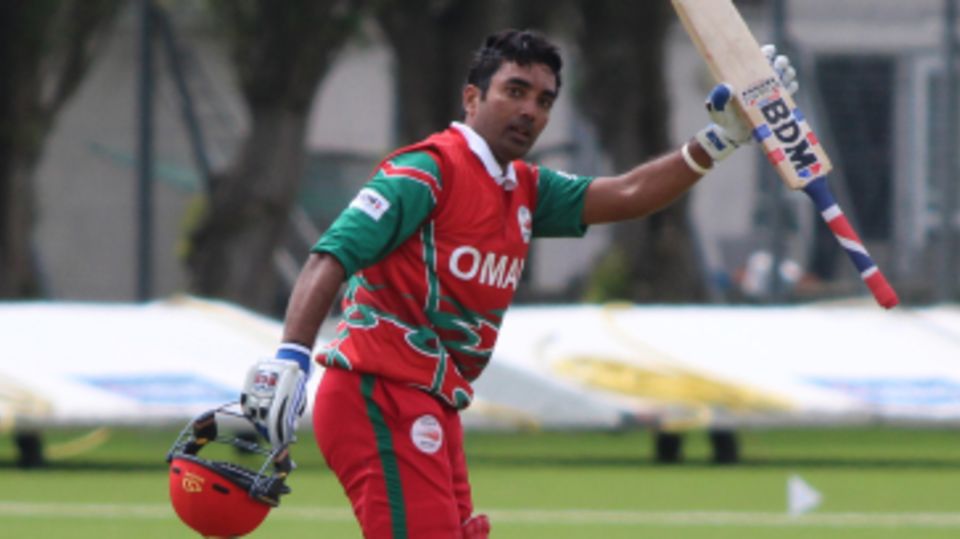 Aamir Kaleem salutes his team-mates after reaching a half-century