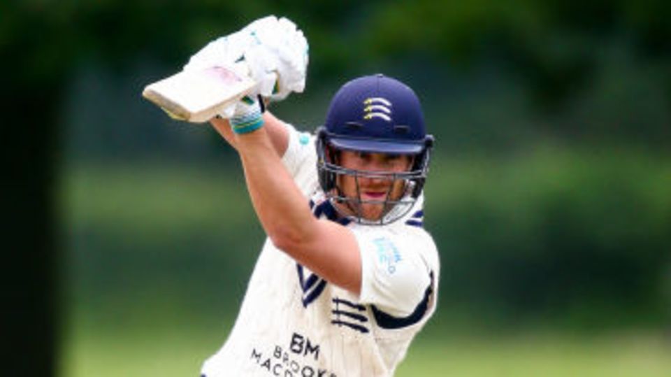 Dawid Malan drives through the covers