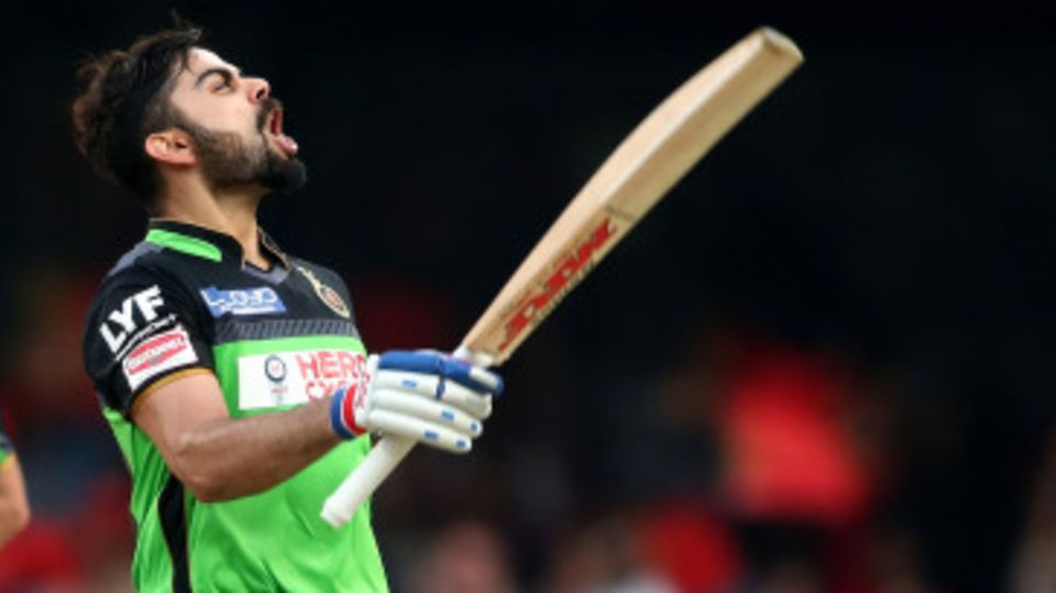 Royal Challengers Bangalore captain Virat Kohli celebrates his hundred