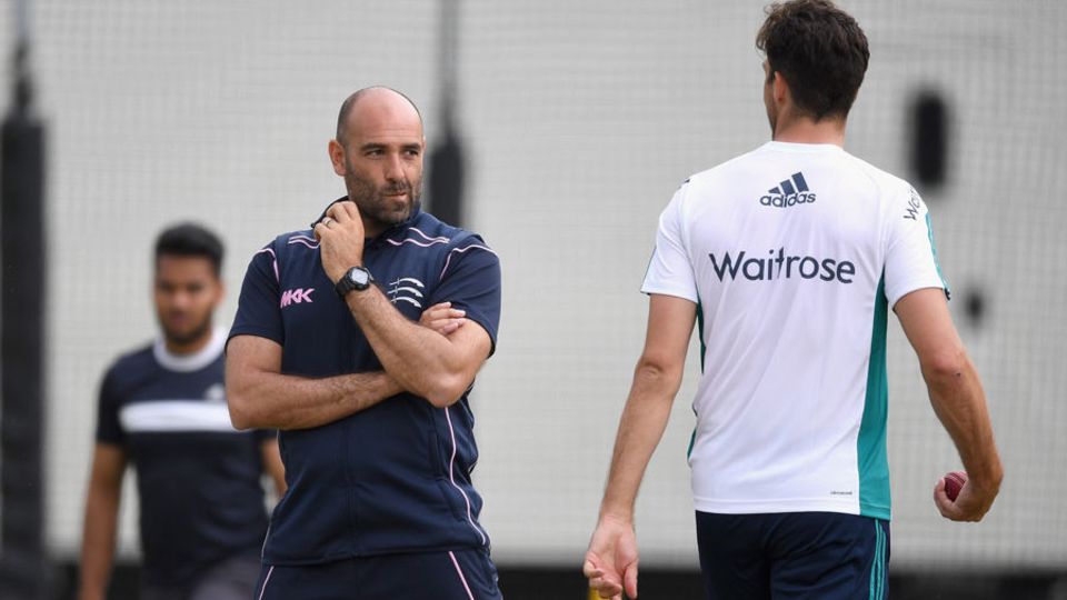 Richard Johnson gives Steven Finn some feedback in the nets