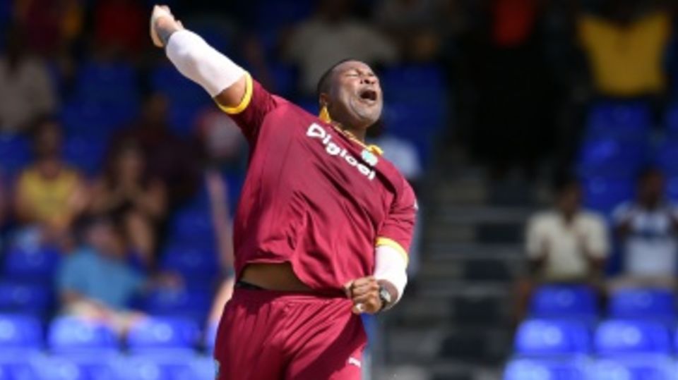 Kieron Pollard celebrates after breaking the opening partnership