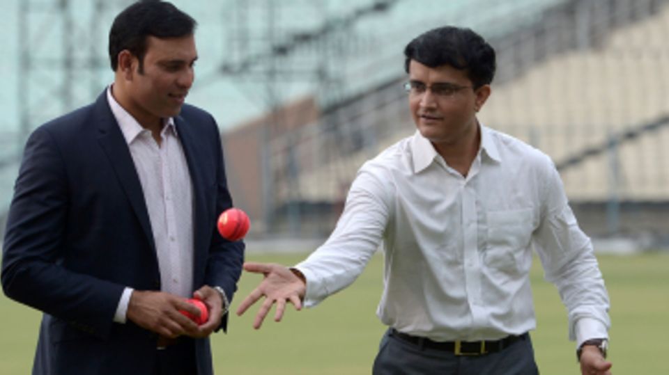 VVS Laxman and Sourav Ganguly gesture at an event for pink-ball cricket