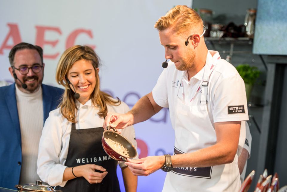Stuart Broad tries his hand at making hoppers at a Taste of London event