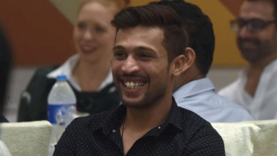 Mohammad Amir is all smiles at an event, ahead of Pakistan's departure to England