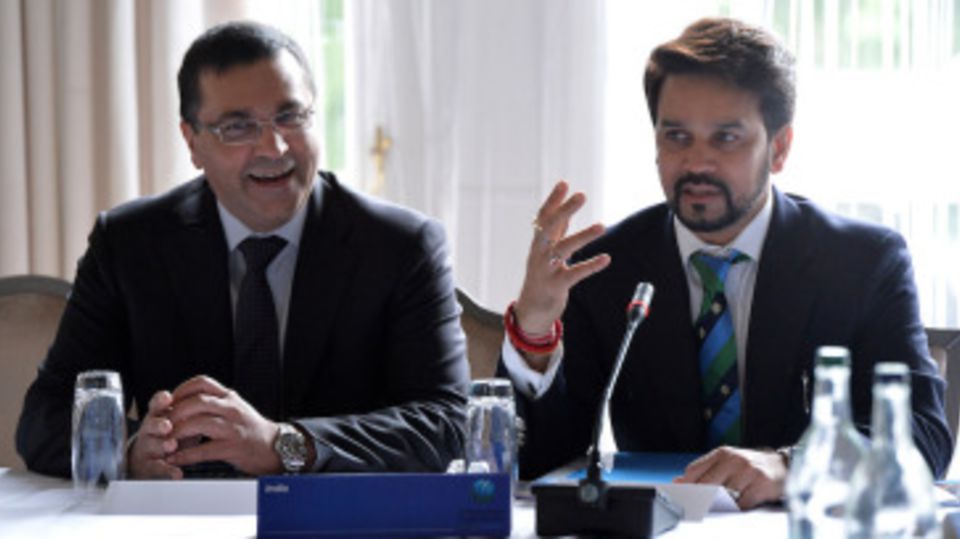 BCCI chief executive Rahul Johri looks on as president Anurag Thakur talks