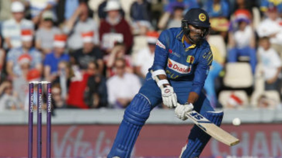 Danushka Gunathilaka attempts to scoop the ball over short fine leg