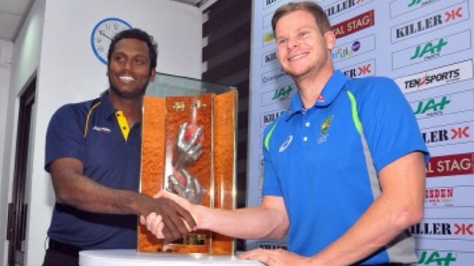 Angelo Mathews and Steven Smith pose with the Warne-Muralitharan trophy