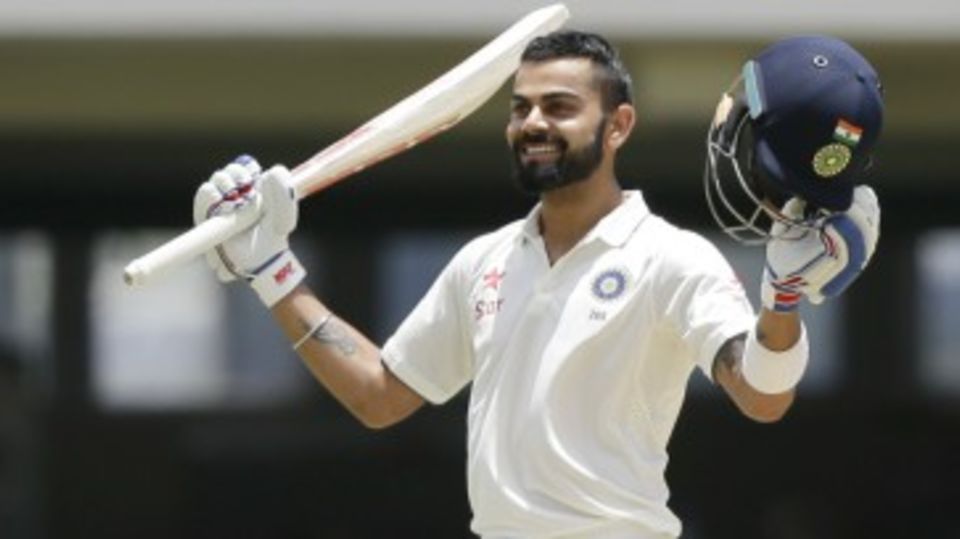 Virat Kohli celebrates his maiden double ton