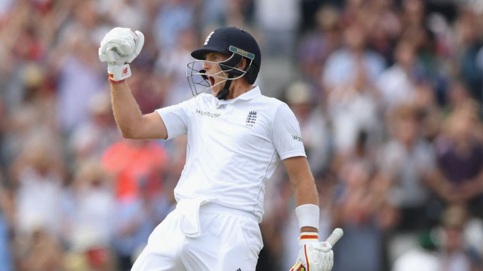 Joe Root punches the air after bringing up his double-century against Pakistan