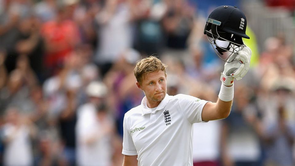 Joe Root takes in the standing ovation for his innings