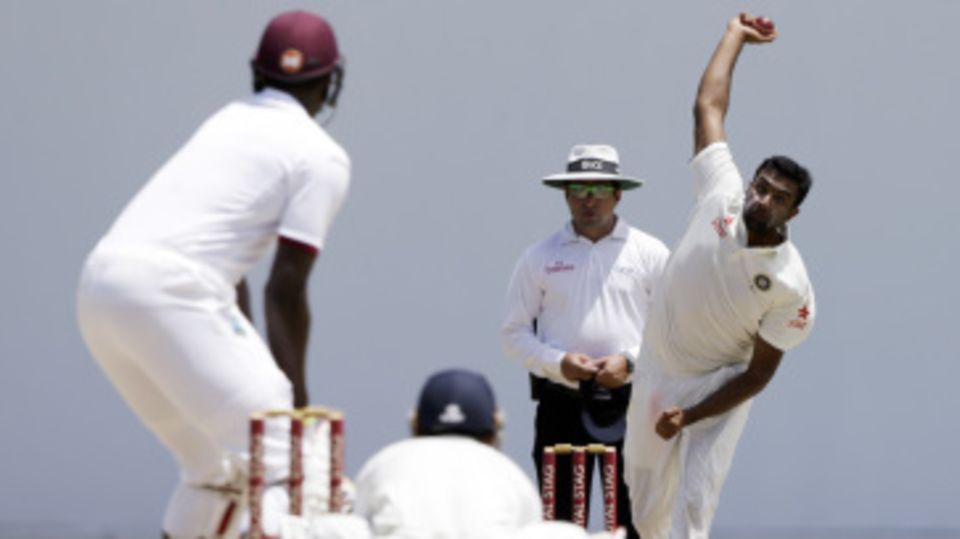 R Ashwin delivers to Jason Holder
