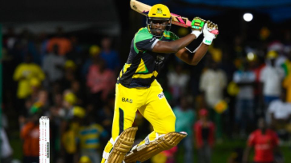 Andre Russell muscles the ball through the off side