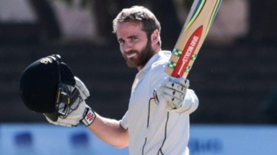 Kane Williamson celebrates after reaching his century