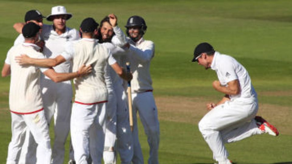 Alastair Cook punches the air in delight after England's victory