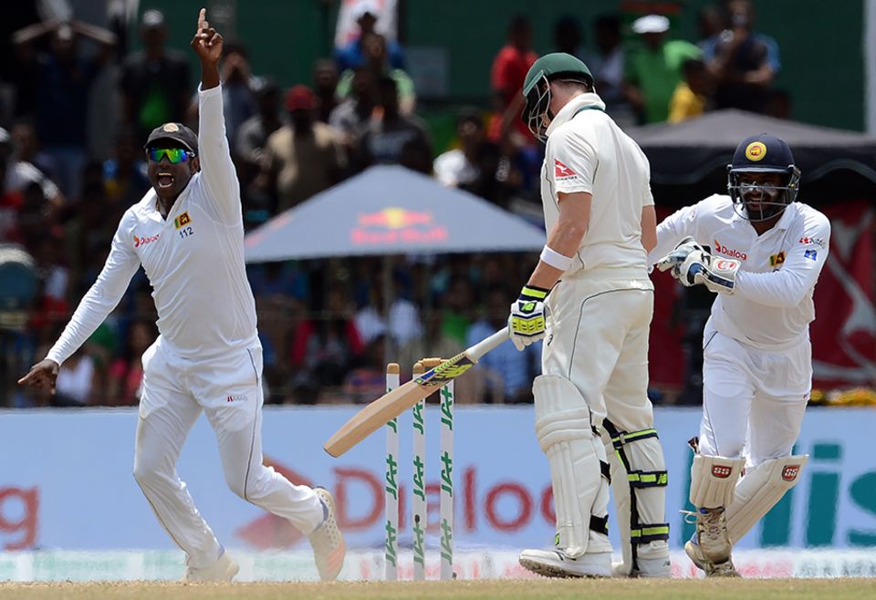 The visitors' hopes of holding Sri Lanka to a draw were quickly dashed in the second session as Steven Smith fell to Rangana Herath